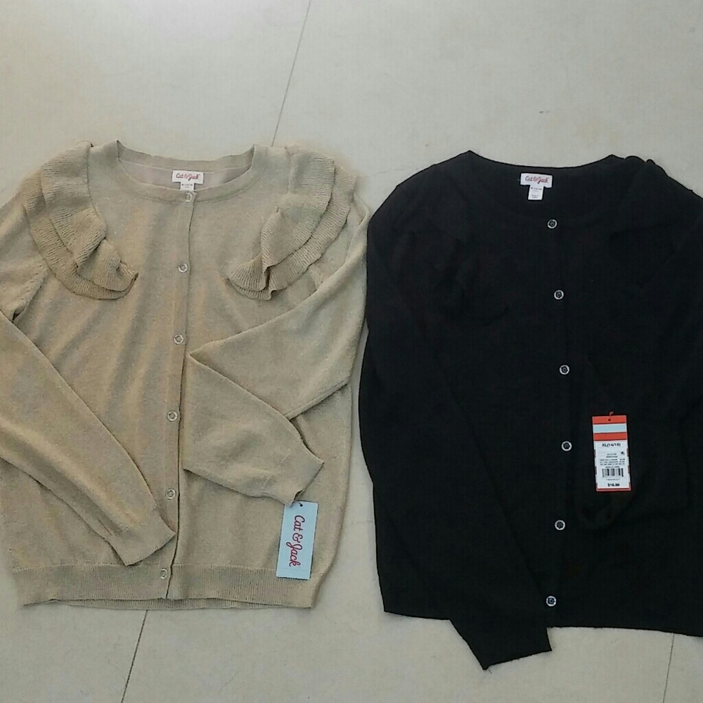 2 NEW SWEATERS. GOLD & BLACK w tags. Both in pkg.